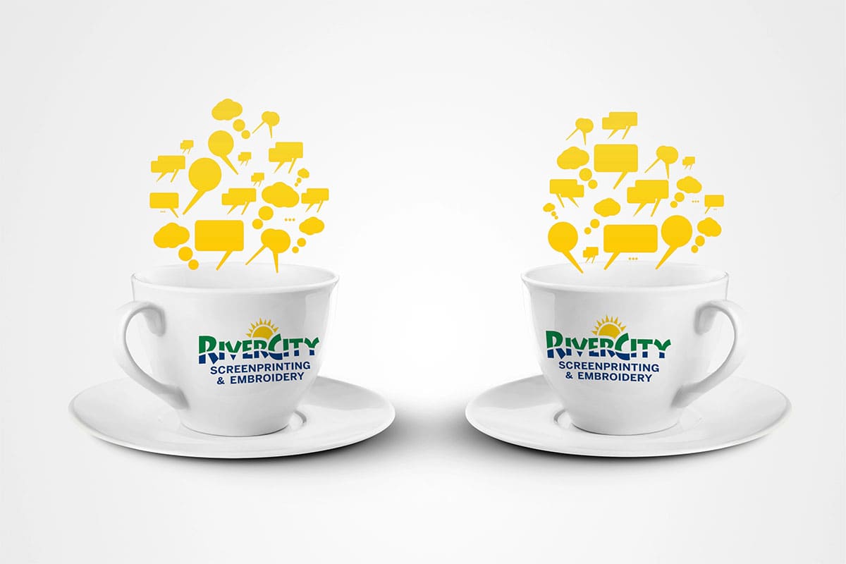 custom-branded-coffee-mugs Two mugs with logos, showcasing San Antonio promotional products.
